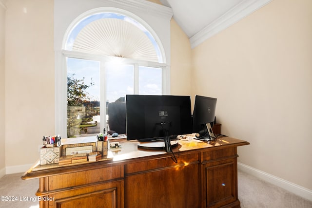 carpeted office with lofted ceiling and crown molding