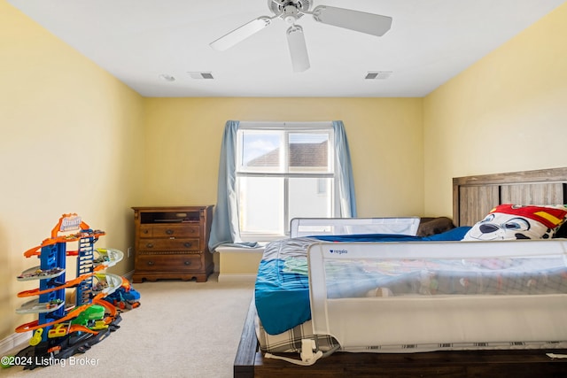 carpeted bedroom featuring ceiling fan