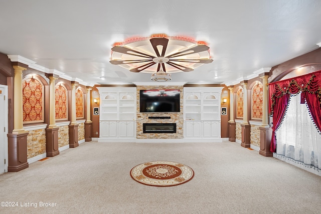 unfurnished living room with ornamental molding and light carpet