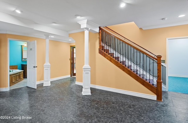 staircase featuring ornamental molding