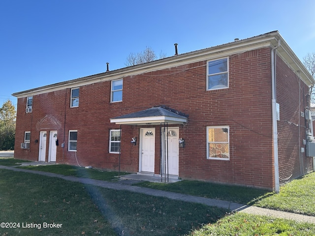 view of front of house with a front yard