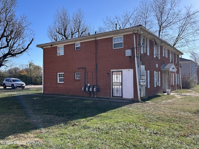 view of property exterior featuring a yard