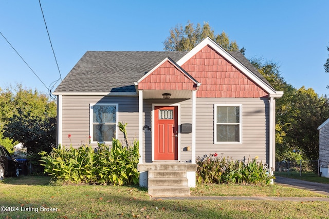 view of front of house with a front lawn