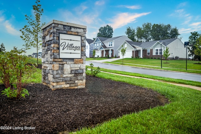 community sign with a yard