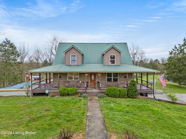 farmhouse inspired home with a front lawn and covered porch