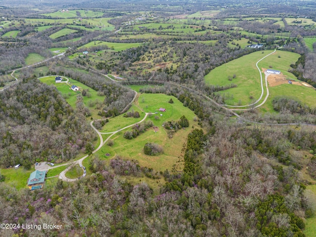 birds eye view of property featuring a rural view