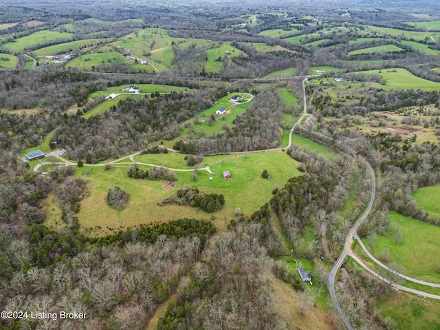 birds eye view of property featuring a rural view