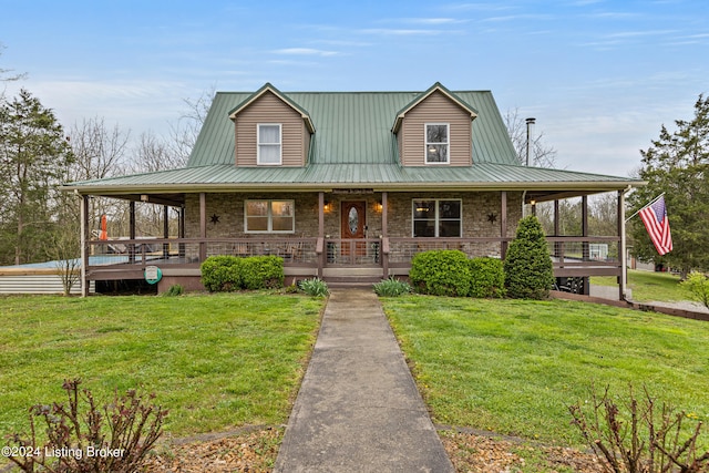 country-style home with a front lawn and a porch