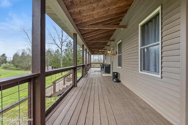 deck featuring a yard