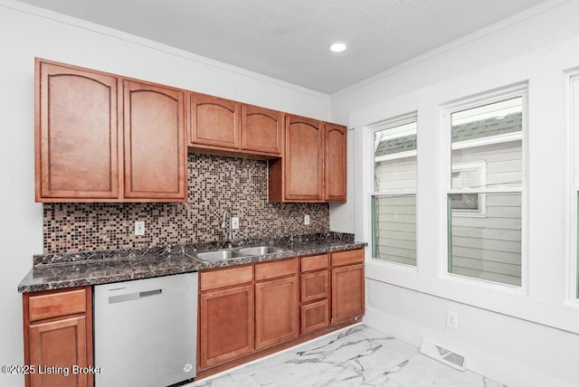 kitchen featuring dishwasher, marble finish floor, dark stone counters, and a sink