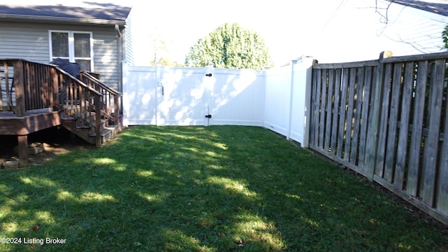 view of yard featuring a deck