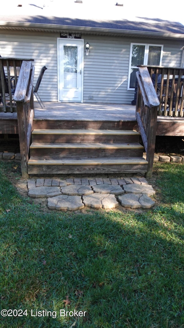 exterior space featuring a yard and a deck