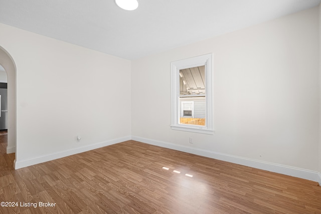 empty room featuring hardwood / wood-style floors