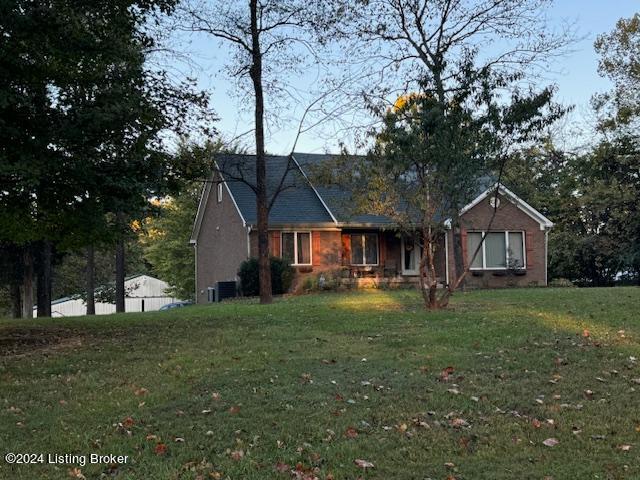 view of front of home with a front yard