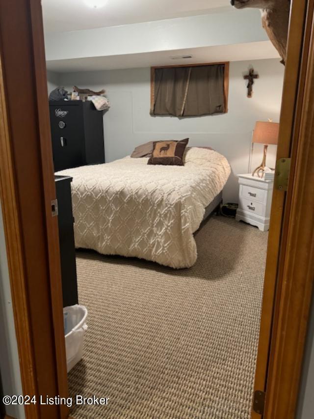 bedroom featuring carpet