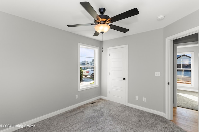 unfurnished bedroom with hardwood / wood-style flooring and ceiling fan