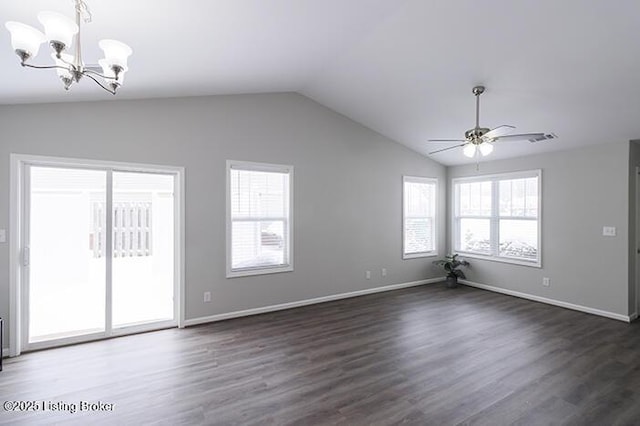 unfurnished room with dark wood-type flooring, lofted ceiling, and ceiling fan with notable chandelier