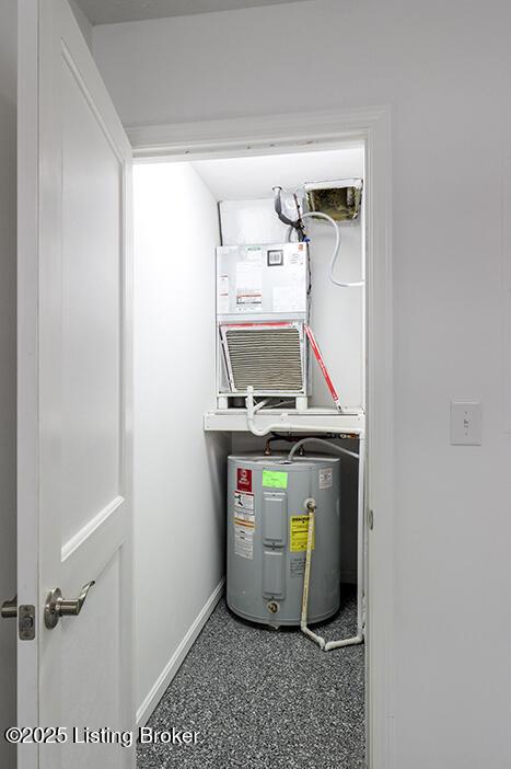 utility room with water heater