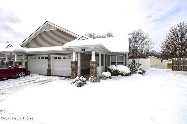 view of front of property with a garage