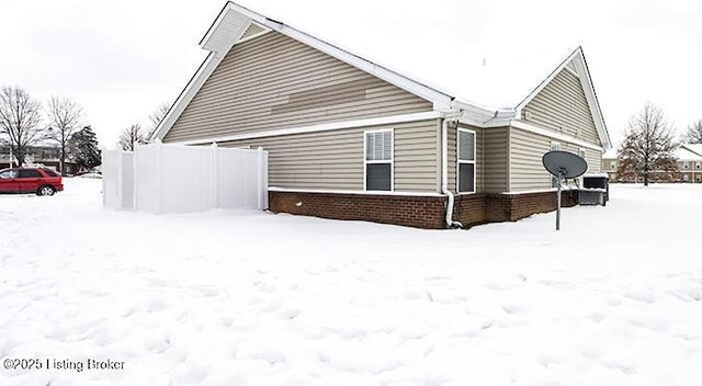 view of snow covered property