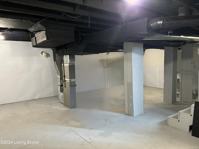 basement featuring heating unit