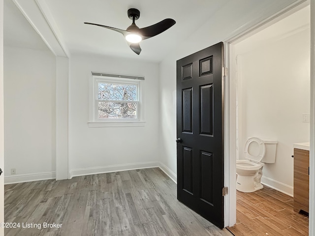 interior space with ceiling fan and light hardwood / wood-style floors