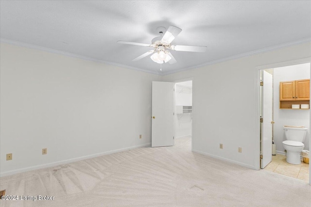 interior space featuring crown molding and ceiling fan