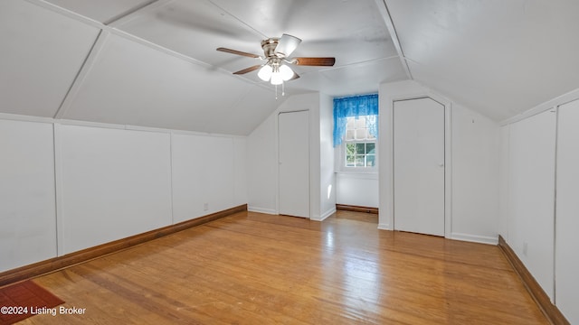 bonus room featuring ceiling fan, lofted ceiling, and light hardwood / wood-style flooring