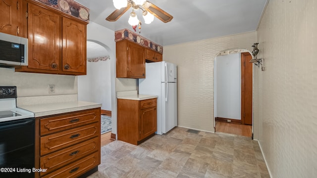 kitchen with ceiling fan and white appliances