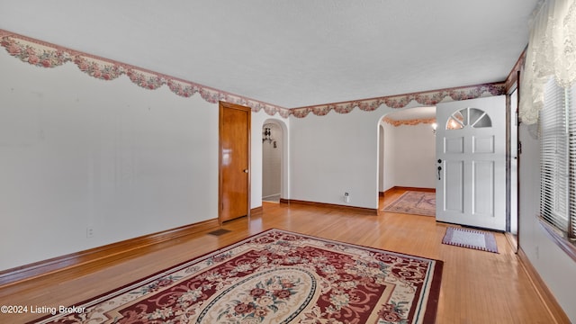 entrance foyer with light hardwood / wood-style floors