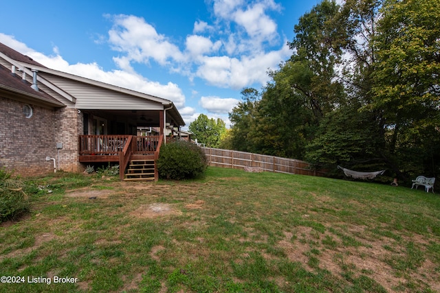 view of yard with a deck