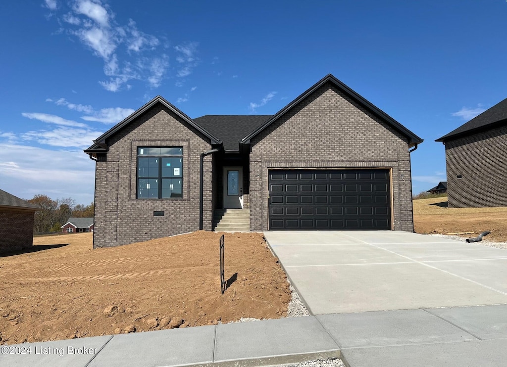 view of front of home featuring a garage