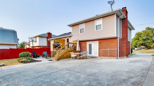 rear view of house with a patio