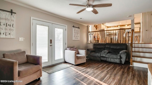 living room featuring french doors, ceiling fan, dark wood-type flooring, and plenty of natural light