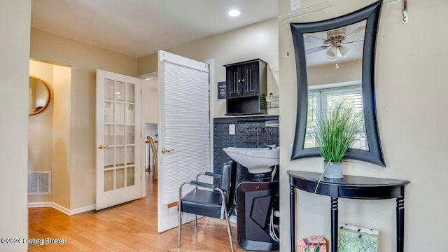 interior space with hardwood / wood-style flooring and ceiling fan