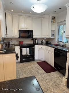 kitchen with sink, black appliances, and white cabinets