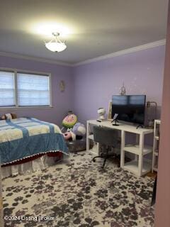 bedroom with crown molding and carpet floors