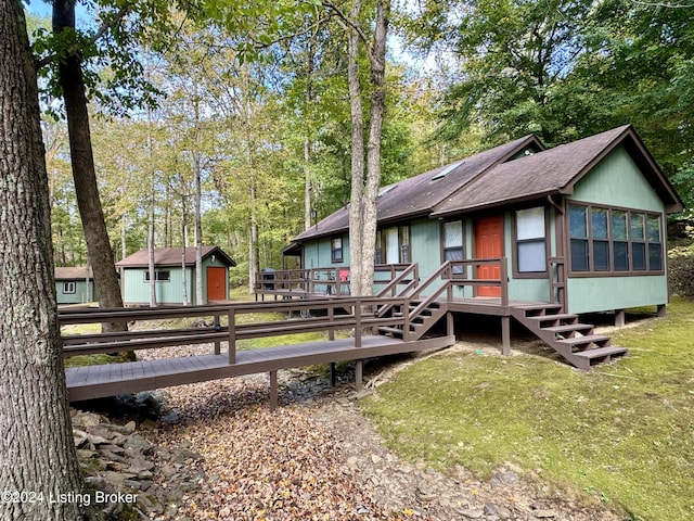 308 Oak Rd, Falls Of Rough, KY 40119 - back of property featuring roof with shingles, a deck, and an outdoor structure