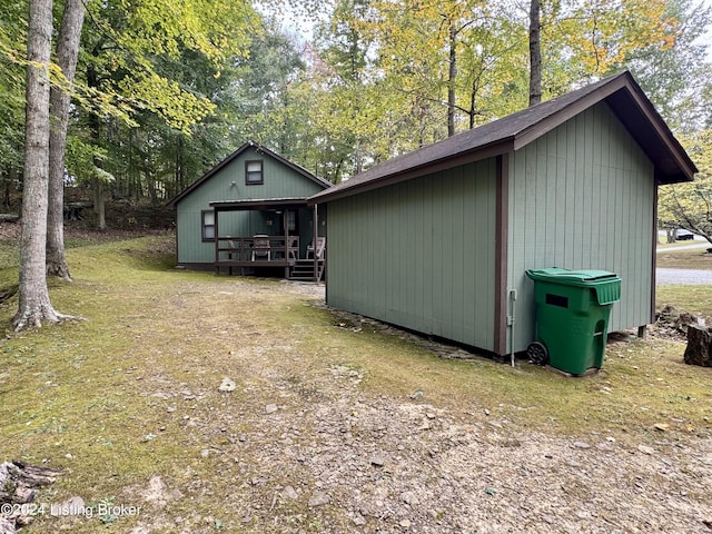 308 Oak Rd, Falls Of Rough, KY 40119 - view of property exterior with a deck and view of wooded area