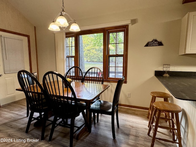 308 Oak Rd, Falls Of Rough, KY 40119 - dining room featuring dark wood finished floors and a chandelier
