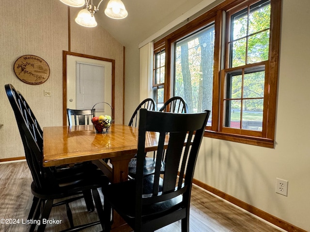 308 Oak Rd, Falls Of Rough, KY 40119 - dining space featuring vaulted ceiling and hardwood / wood-style floors
