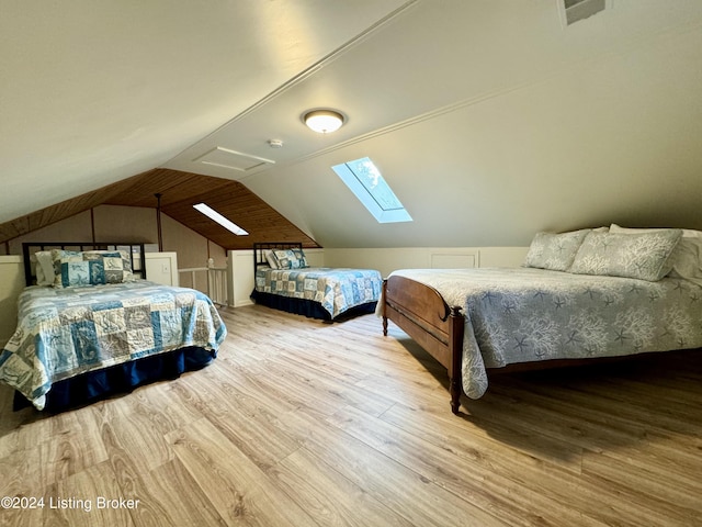 308 Oak Rd, Falls Of Rough, KY 40119 - bedroom featuring wood finished floors, lofted ceiling, and a skylight