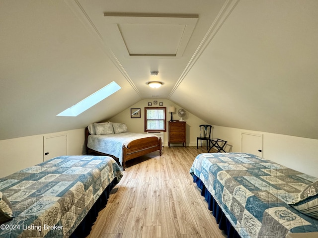 308 Oak Rd, Falls Of Rough, KY 40119 - bedroom featuring wood finished floors, vaulted ceiling, and a skylight