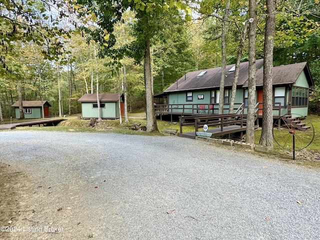 308 Oak Rd, Falls Of Rough, KY 40119 - view of front of house with a shed, driveway, and view of wooded area