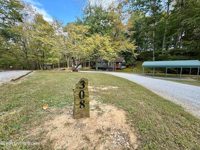 308 Oak Rd, Falls Of Rough, KY 40119 - view of front facade with a front lawn and a carport