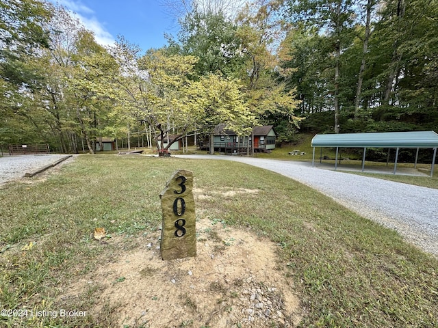 308 Oak Rd, Falls Of Rough, KY 40119 - view of front of property with a front yard, driveway, and a detached carport