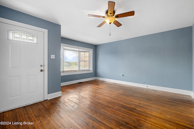 foyer featuring ceiling fan and dark hardwood / wood-style floors