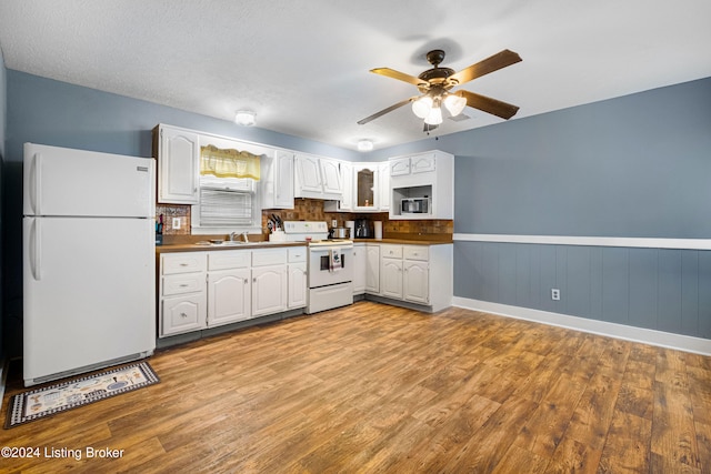 kitchen with light hardwood / wood-style flooring, white cabinetry, white appliances, a textured ceiling, and ceiling fan