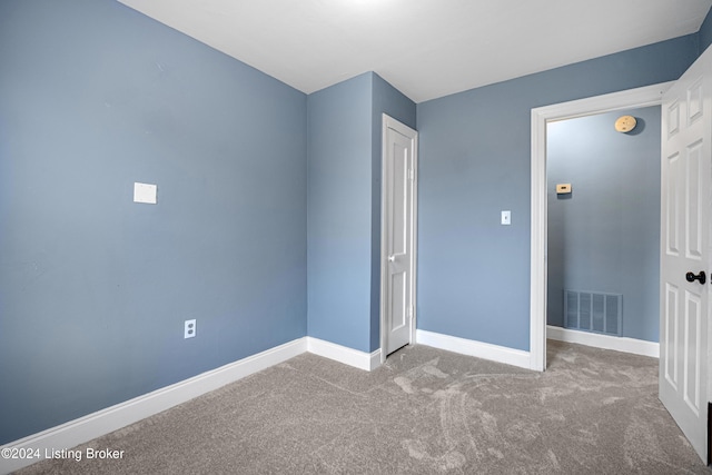 unfurnished bedroom featuring carpet flooring