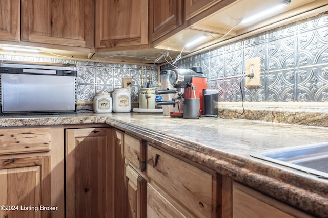 kitchen featuring backsplash